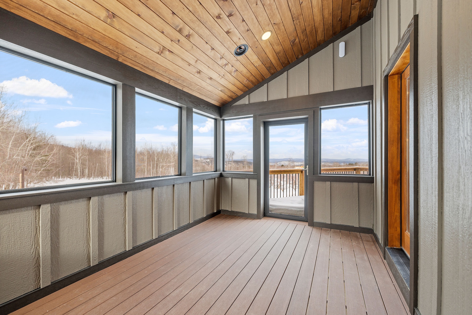 Empty balcony with doors and a sliding glass door opens to the outside